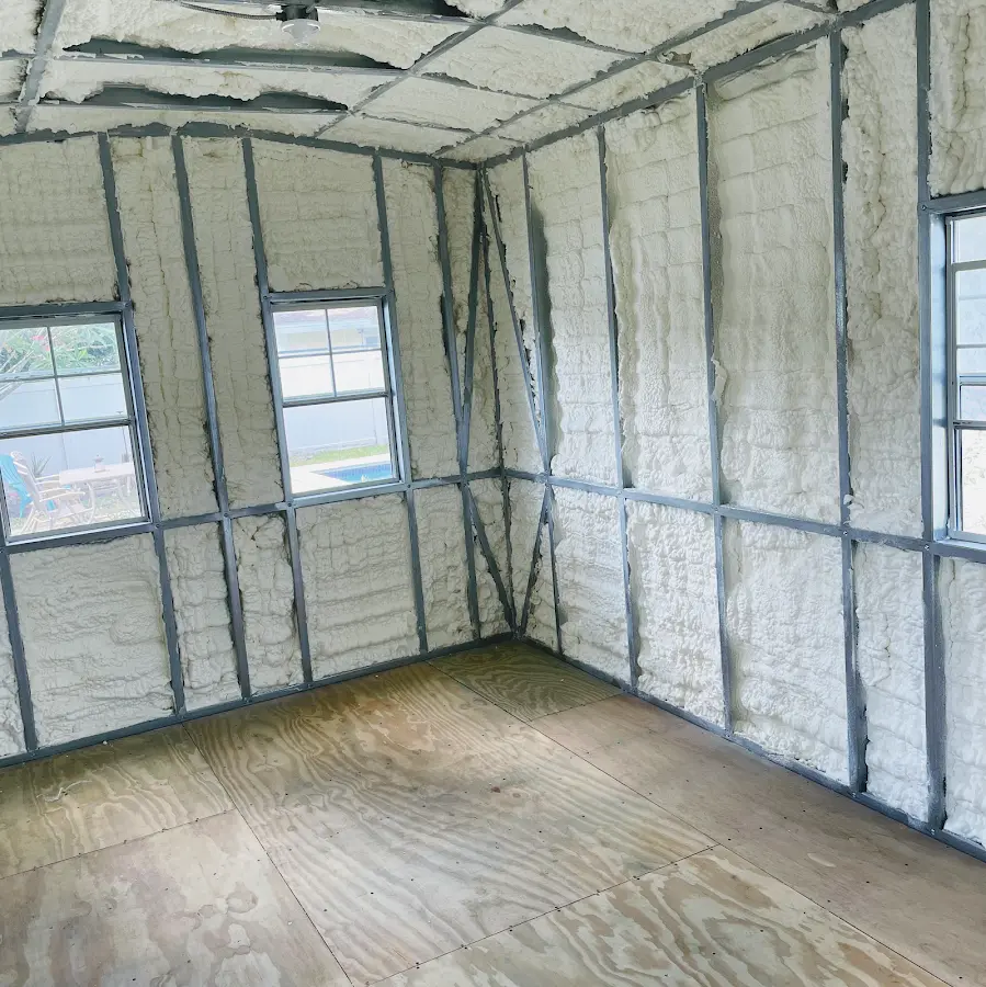 Closed-cell spray foam insulation applied to wall cavities in a residential project in Glencoe